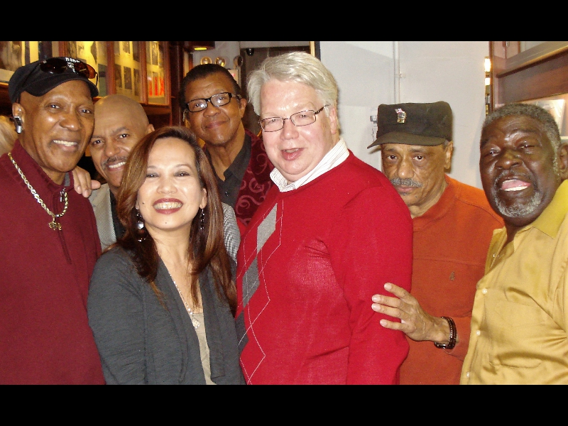 April 18, 2011: What�s that? Just me, ZOHO chief Jochen, pushing myself into the middle of this photo op with the Persuasions and Charito!