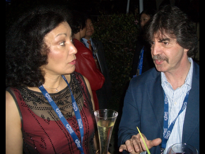 GRAMMY 2007: Iris Becker, wife of ZOHO's Jochen Becker, listening to a great story told by ZOHO publicist Jim Eigo.