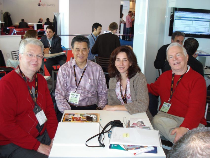 Cannes, France, January 19, 2009: ZOHO President Jochen Becker (left), in a meeting with his Southeast Asian distributor Stephen Mok, from Master Music Ltd, Hong Kong, and Alex Aron and Roger Davidson from Soundbrush Records.