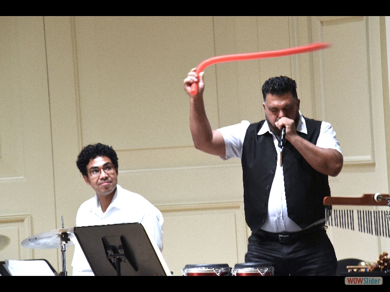 September 21, 2018: Drummer Francis Benitez staying in the groove with the masterful percussionist Roberto Quintero, getting extremely musical sounds out of what looks like a garden hose and a police whistle! Photo: Melanie Futorian.